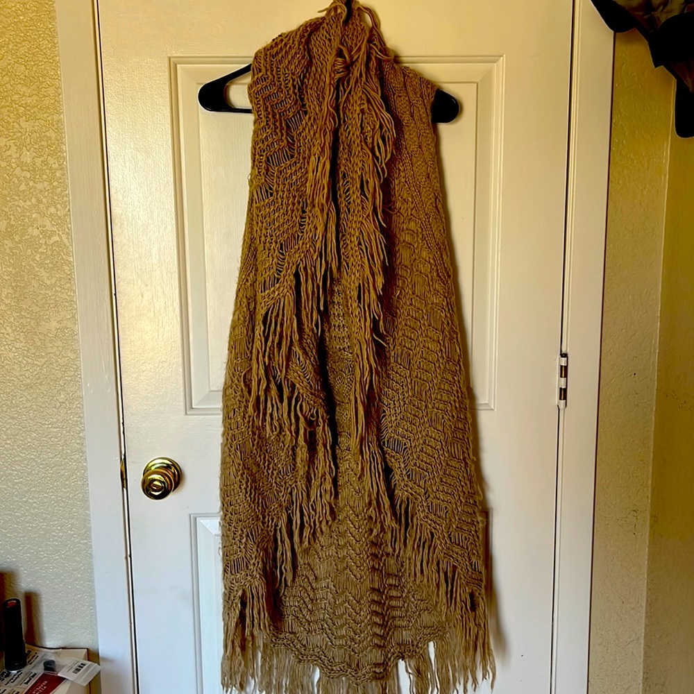 Beige fringe long sweater vest.